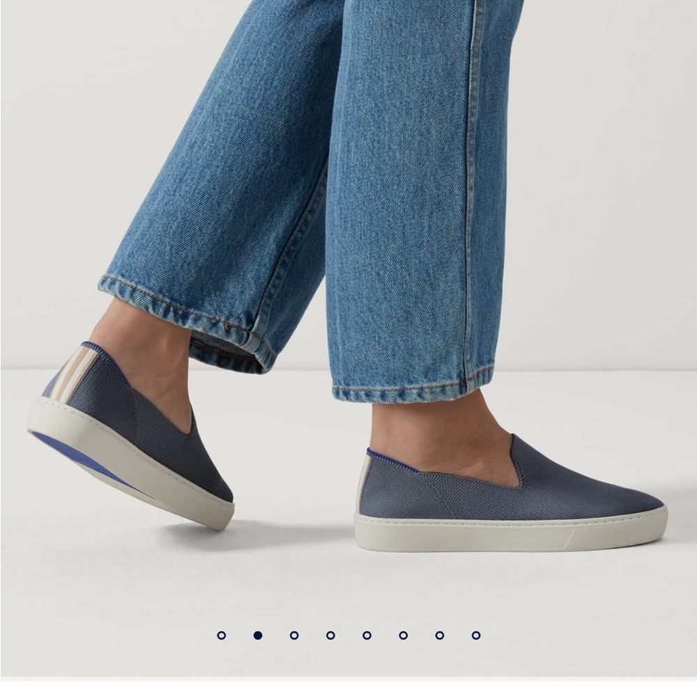 Rothy's Slip-On Sneakers in black with blue Stripe